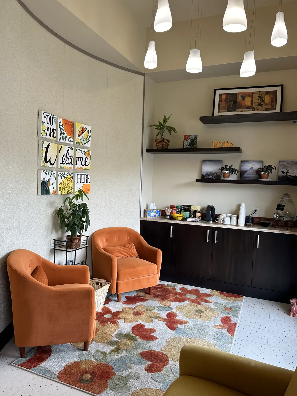 Counseling office with orange armchairs