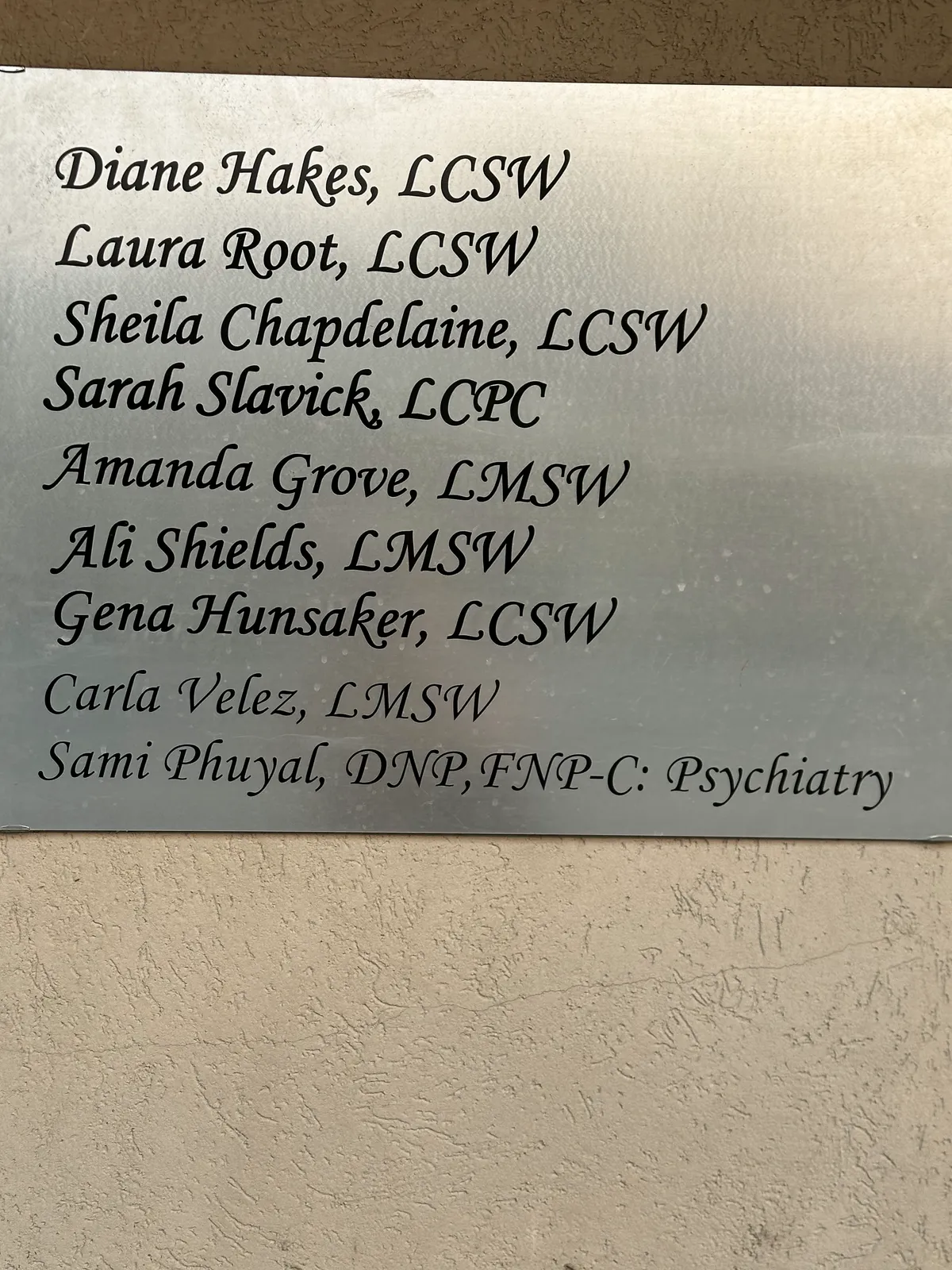 Office directory sign listing Gena Hunsaker, LCSW